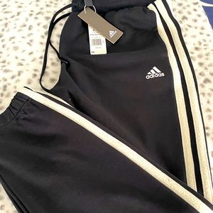 Brand new Adidas three white stripe sweatpants.Original tags size 2 XL
